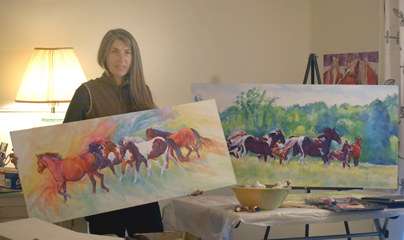 Equine Artist Karen Brenner and two paintings featuring mustangs at the Carr Ranch in Tennessee